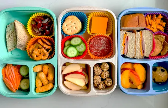 lunch box with apple、snacks and bread